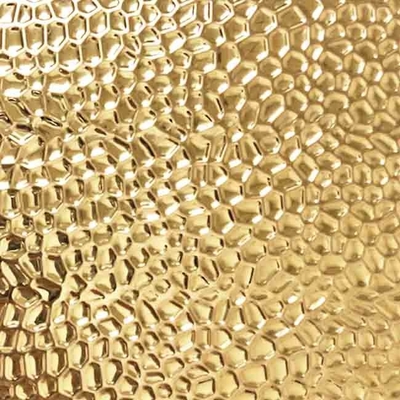 El color oro grabó en relieve el modelo inoxidable del panal de la hoja de acero