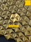 Pared hexagonal del fondo de la etiqueta engomada de la pared del cuarto de baño de la casa del ladrillo del mosaico del metal del oro