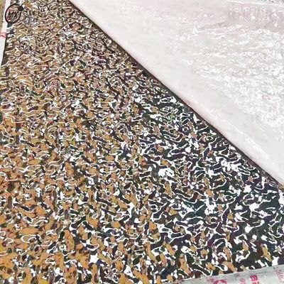 Buen precio Techo de KTV 304  Gran Plata Ondulada en Relieve Espejo 8k  Decoración de Lámina de Acero Inoxidable en línea